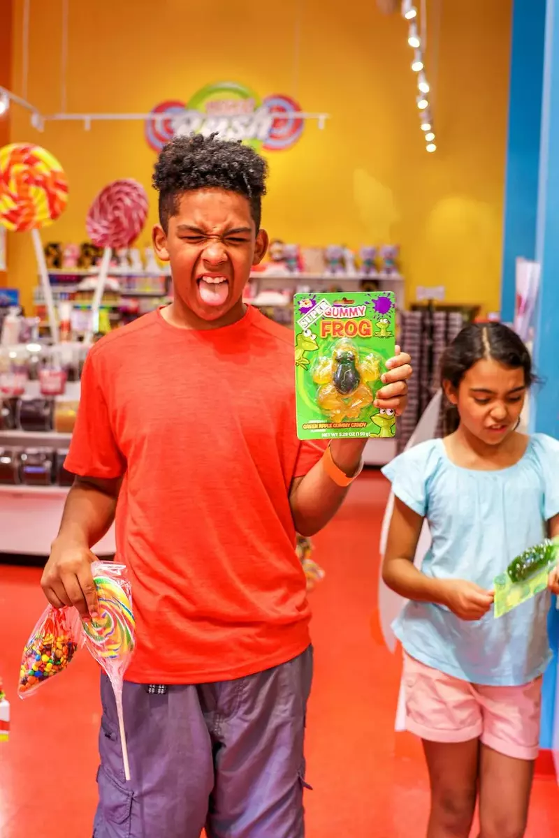 kids shopping for candy at Sugar Rush