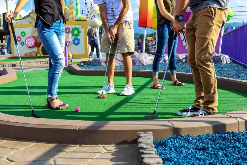 playing tooftop mini golf at Crave Golf Club